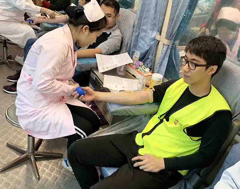 百投集團團委組織青年參加全市學雷鋒精神志愿者行動